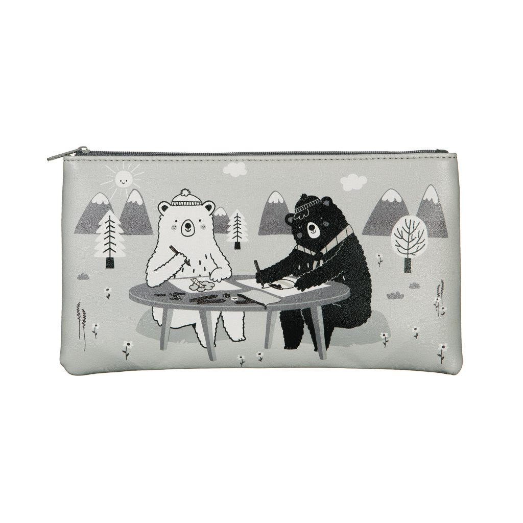 A photograph on a white background of a Sass & Belle pencil case which has a grey background and illustrations of two bears wearing hats outdoors and sitting at a table drawing and there are trees and snow capped mountain illustrations in the background